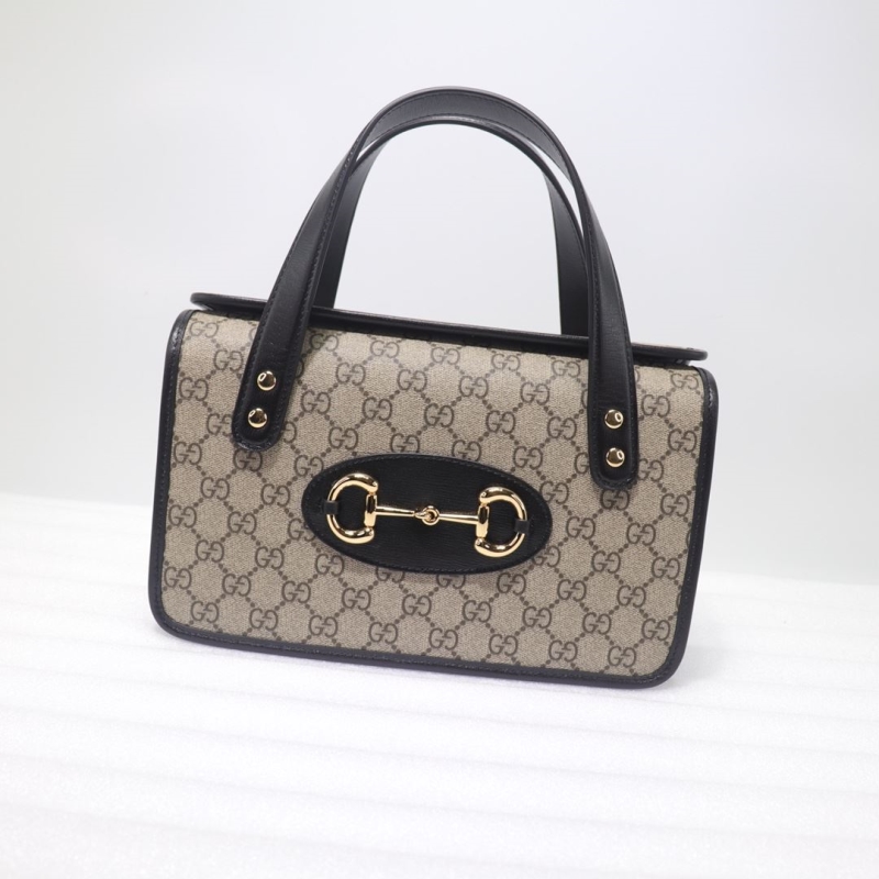 G*u*i top handle bags